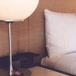 Lodging - Silver and White Desk Lamp Beside Bed