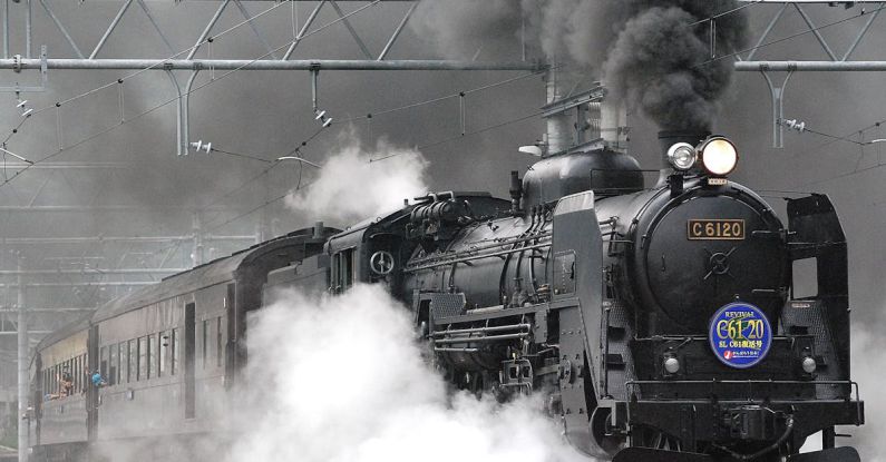 Train - Black Train on Rail and Showing Smoke