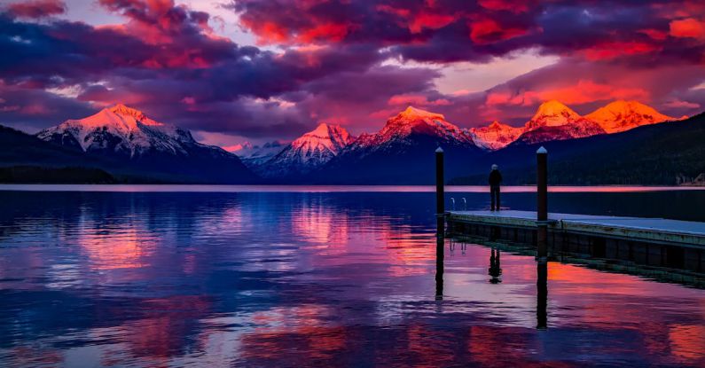 Sunsets - Dock Under Cloudy Sky in Front of Mountain
